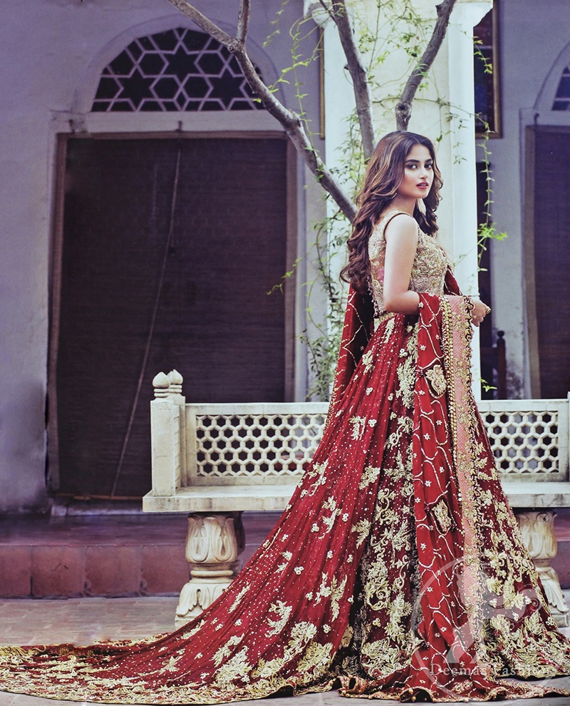 Intricately embroidered gown in the silver color combination