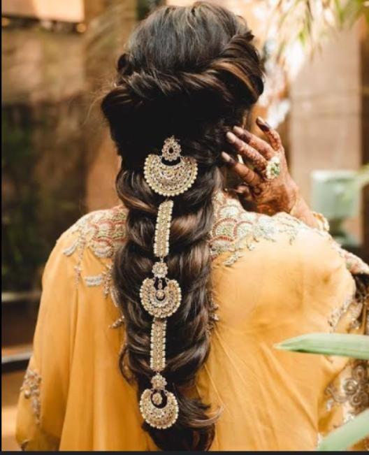 Traditional kerala hairstyle with towel hair bun on Craiyon