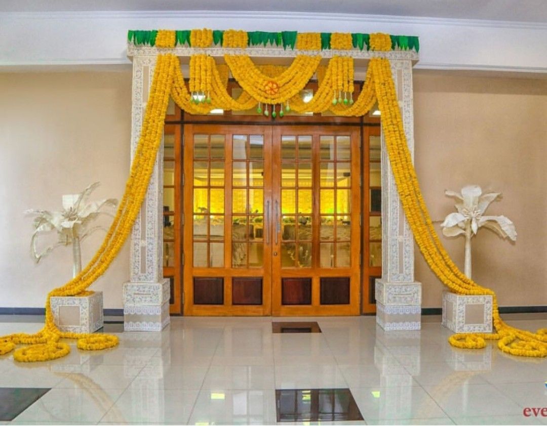 Grand entrance, draped with marigold!