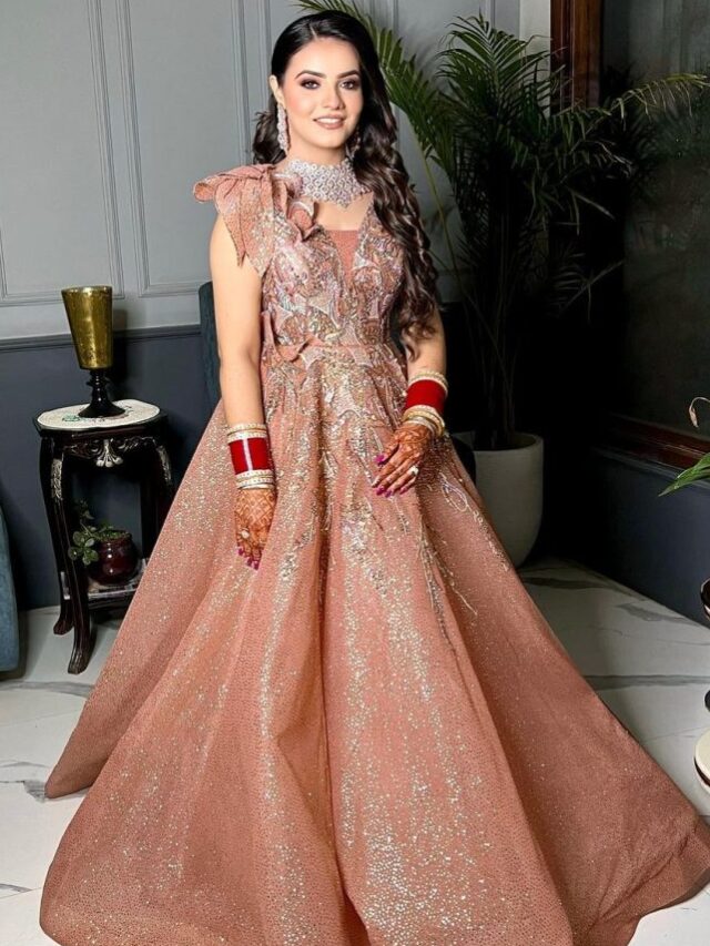 Maroon ruffled gown by Gaurav Gupta